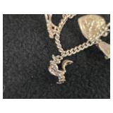 59-grams (total) Sterling Silver - Lot of (2) Charm Bracelets