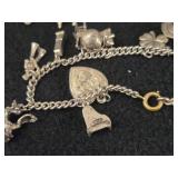 59-grams (total) Sterling Silver - Lot of (2) Charm Bracelets