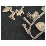 59-grams (total) Sterling Silver - Lot of (2) Charm Bracelets