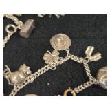 59-grams (total) Sterling Silver - Lot of (2) Charm Bracelets