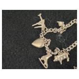 59-grams (total) Sterling Silver - Lot of (2) Charm Bracelets