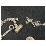 59-grams (total) Sterling Silver - Lot of (2) Charm Bracelets