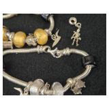 61.2-grams (total) Sterling Silver - Lot of (2) Charm Bracelets