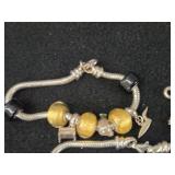 61.2-grams (total) Sterling Silver - Lot of (2) Charm Bracelets