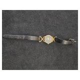 Gucci Ladies Wrist Watch with Gold Plated Case and Black Textured Leather Strap