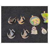 Lot of (9) Jewelry - Pendant (x4), Ship theme Pins (x4), House theme Pin (x1)