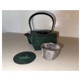 Green and Black Cast Iron Teapot With Infuser
