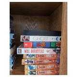 Mixed VHS Tape Lot Movies Anime Aviation Oshkosh Yu-Gi-Oh! Titles and with a vintage Orion Automatic VHS Rewinder RW1300