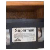 Mixed VHS Tape Lot Movies Anime Aviation Oshkosh Yu-Gi-Oh! Titles and with a vintage Orion Automatic VHS Rewinder RW1300