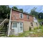 Studio Home with 20x40 Garage/Workshop on .66 +/- Acre 
