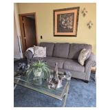 Beautiful Grey Sofa right on Trend with 2 side pillows from Ashley $400.00 Great shape