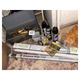 Toolbox, light bulbs, bug spray