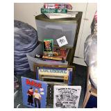 Storage Drawers, VCR Movies, Big Calculator, Books