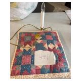 quilt square decor and window lamp