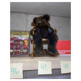 Teddy Bear in Wooden Rocking Chair