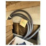 Coiled Gray Electrical Conduit