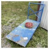 Blue Metal Flatbed Utility Cart with Red Cast Obje