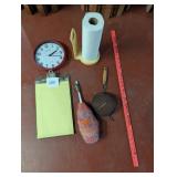 clipboard, clock, duster, ruler, paper towel
