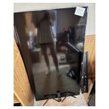 Roku TV and wall mount