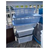 one stack of totes with lids