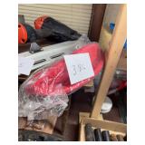 Packaged Red Textile Item with Auction Number 386