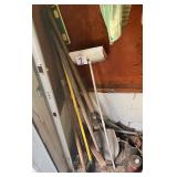 Garage lot, shovels, yard tools