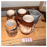 Collection of Five Decorative Ceramic Mugs