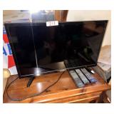 Toshiba Flat Screen Television with Remotes