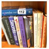 GROUP OF BOOKS WITH METAL BOOKENDS