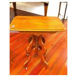 ANTIQUE EASTLAKE PARLOR TABLE ON CASTERS
