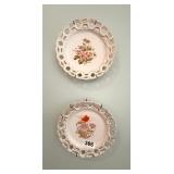 PAIR OF HANDPAINTED PLATES HANGING ON WALL