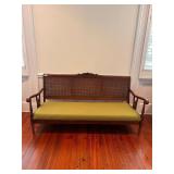 MCM WOODEN CANE BACK SETTEE-LIME GREEN CUSHION