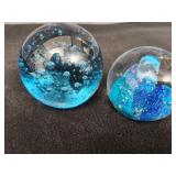 Two Blue Glass Paperweights