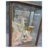 Two Porcelain Dolls in Display Case, Dolls need