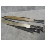 Two Machetes in sleeves
