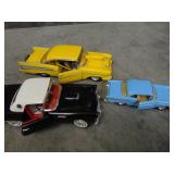 Three Die Cast Cars