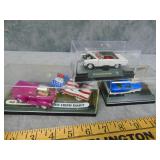 4 Die Cast Cars in Cases