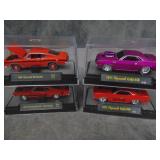 4  Die Cast Cars in Cases