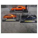 3  Die Cast Cars in Cases