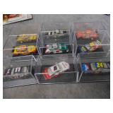 Nine Die Cast Cars in Cases