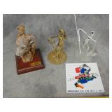 Figurines and Sign
