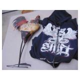 Metal Rooster and Black Hoodie