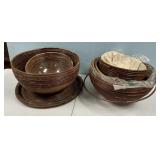 Group of pencil reed rattan bowls