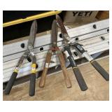 Three Hedge Trimmers