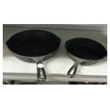 Two Cast Iron Skillets