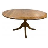 Oak Pedestal Oval Dining Table 30'h., 60'l, 40'