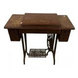 Singer Machine in Cabinet 30'h., 34'w