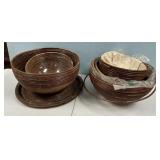 Group of pencil reed rattan bowls