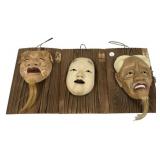 Three vintage Japanese Noh theater masks known as