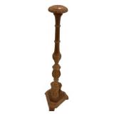 Carved wood pillar candle holder
